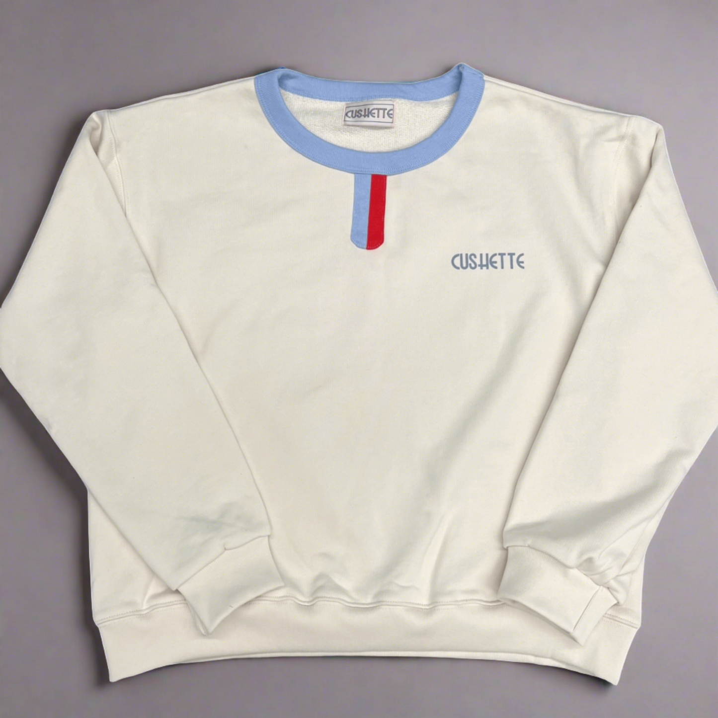 White tab collar sweatshirt.